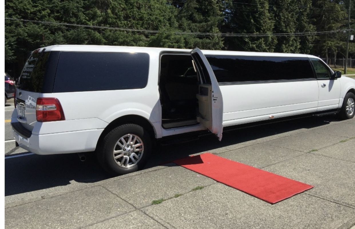 White Lincoln Town Car stretch limousine prepared for a wedding